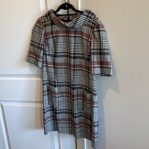 Trina Turk houndstooth dress with short sleeves and front pockets